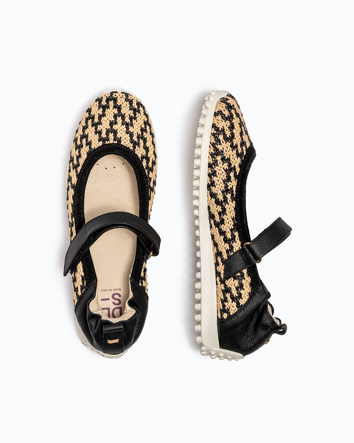 Black, beige velour and woven fabric DLS ballet flats, shown in a studio still life.
