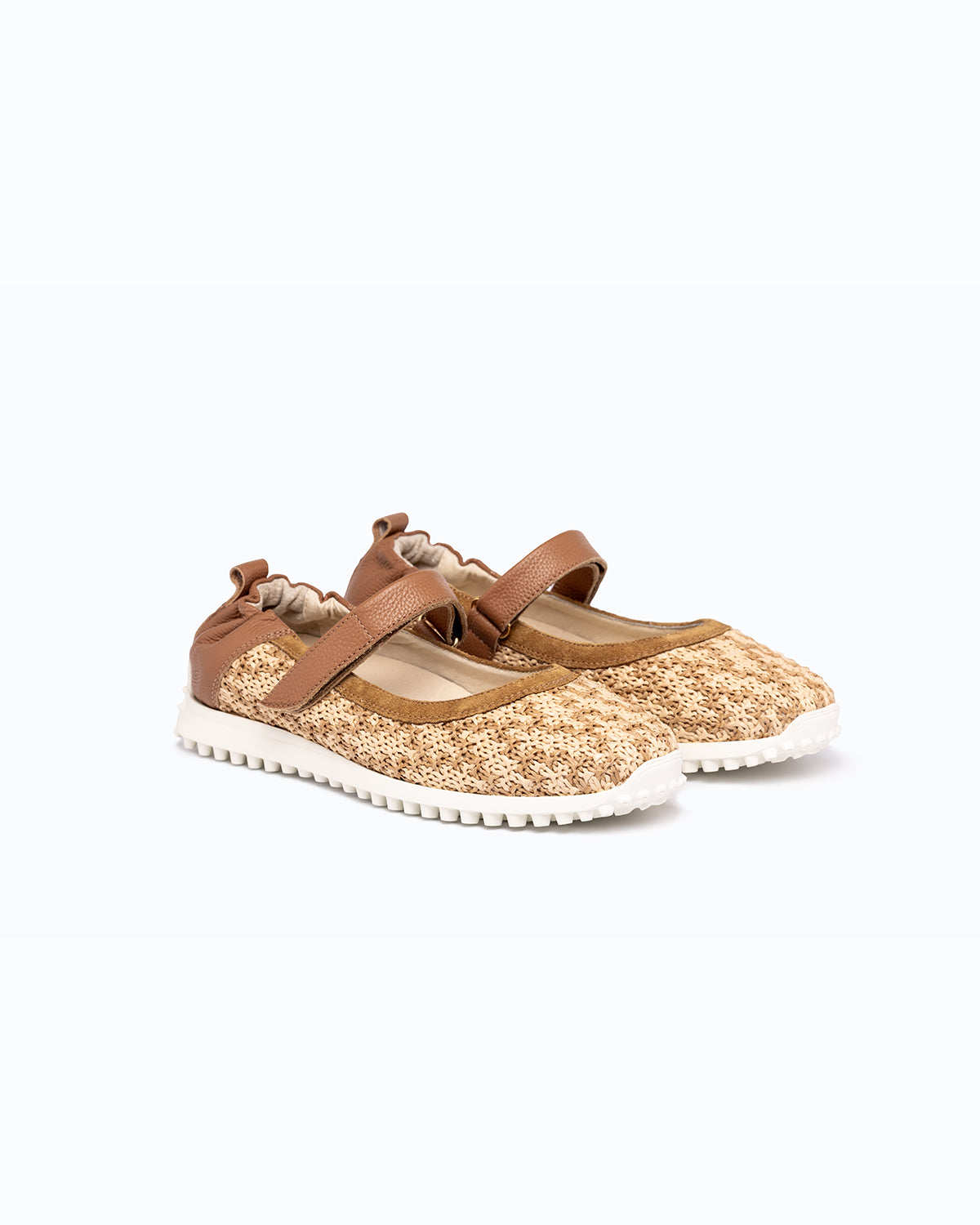 Brown, beige velour and woven fabric DLS ballet flats, shown in a studio still life.