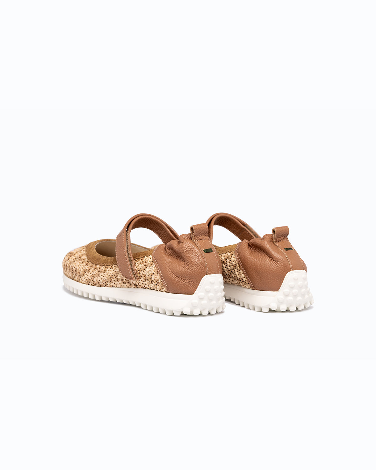 Brown, beige velour and woven fabric DLS ballet flats, shown in a studio still life.