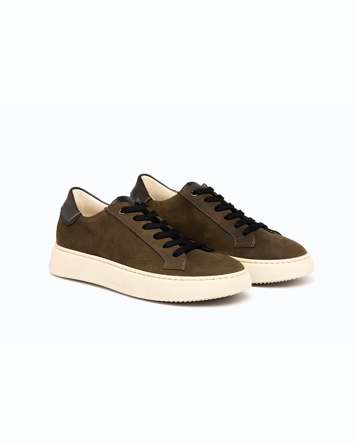 Black, brown nubuck and nappa leather DLS sneakers, shown in a studio still life.
