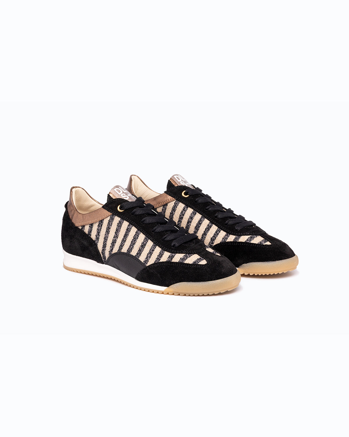 Black, bronze velour and woven fabric DLS sneakers with side zip, shown in a studio still life.