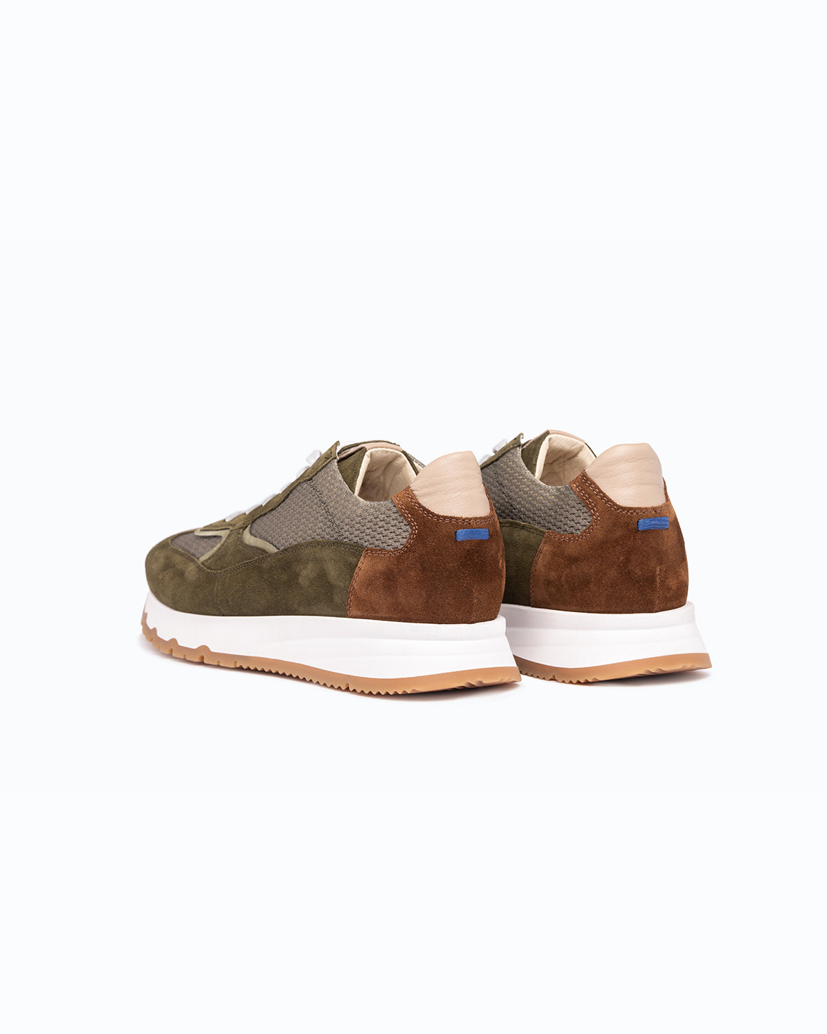 Green, brown, beige velour DLS sneakers, shown in a studio still life.