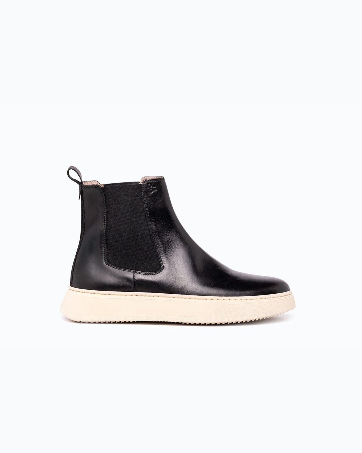 Black velour and leather DLS boots, shown in a studio still life.