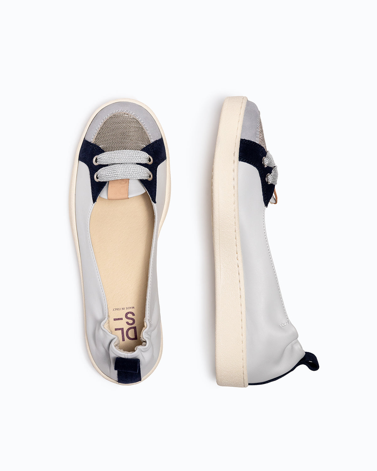 Sky blue, navy nappa leather and nubuck DLS ballet flats, shown in a studio still life.
