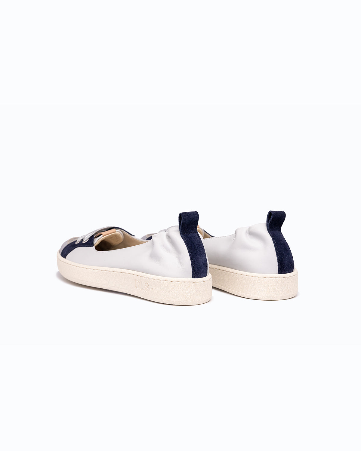 Sky blue, navy nappa leather and nubuck DLS ballet flats, shown in a studio still life.