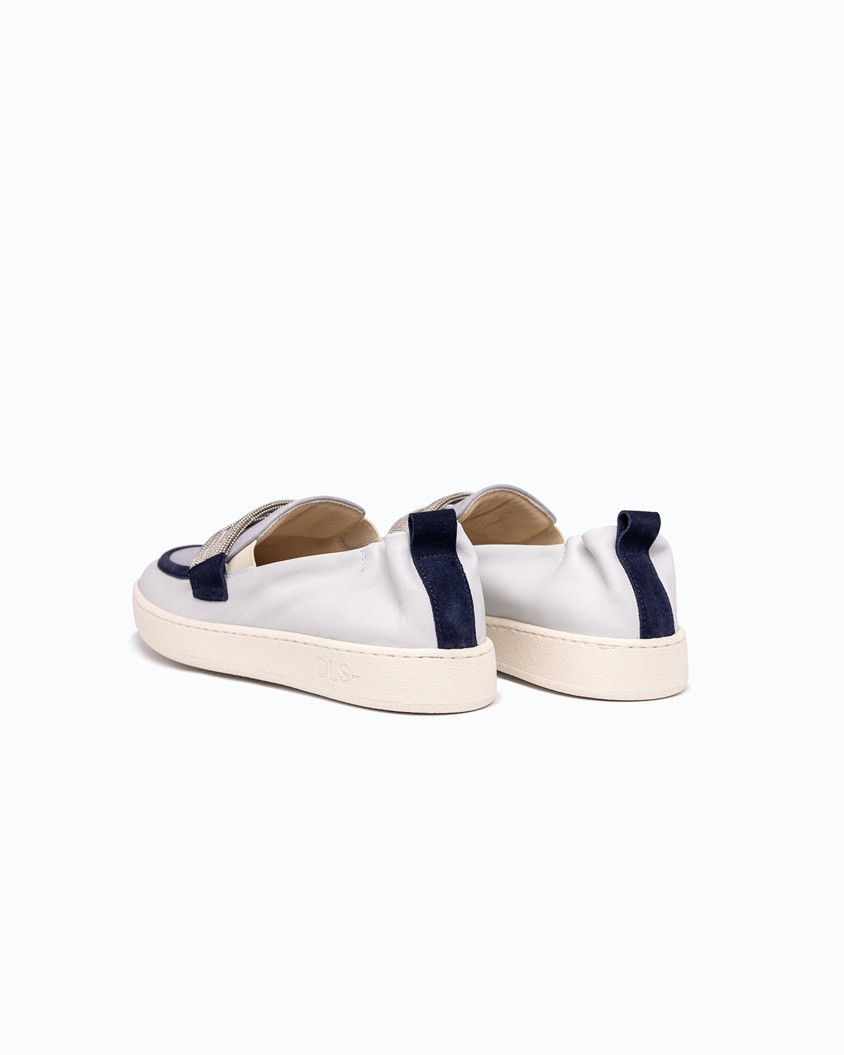 Off-white, sky blue, navy nappa leather and nubuck DLS loafers, shown in a studio still life.