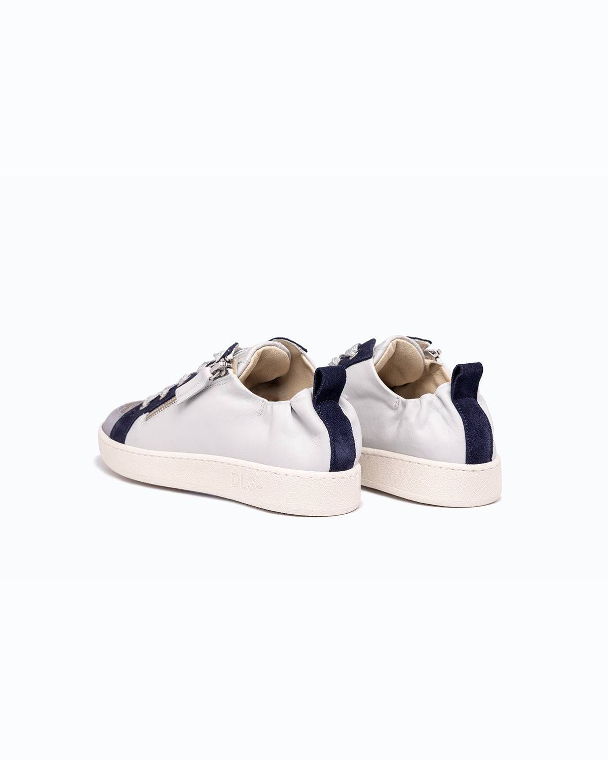 Sky blue, navy nubuck and nappa leather DLS sneakers, shown in a studio still life.