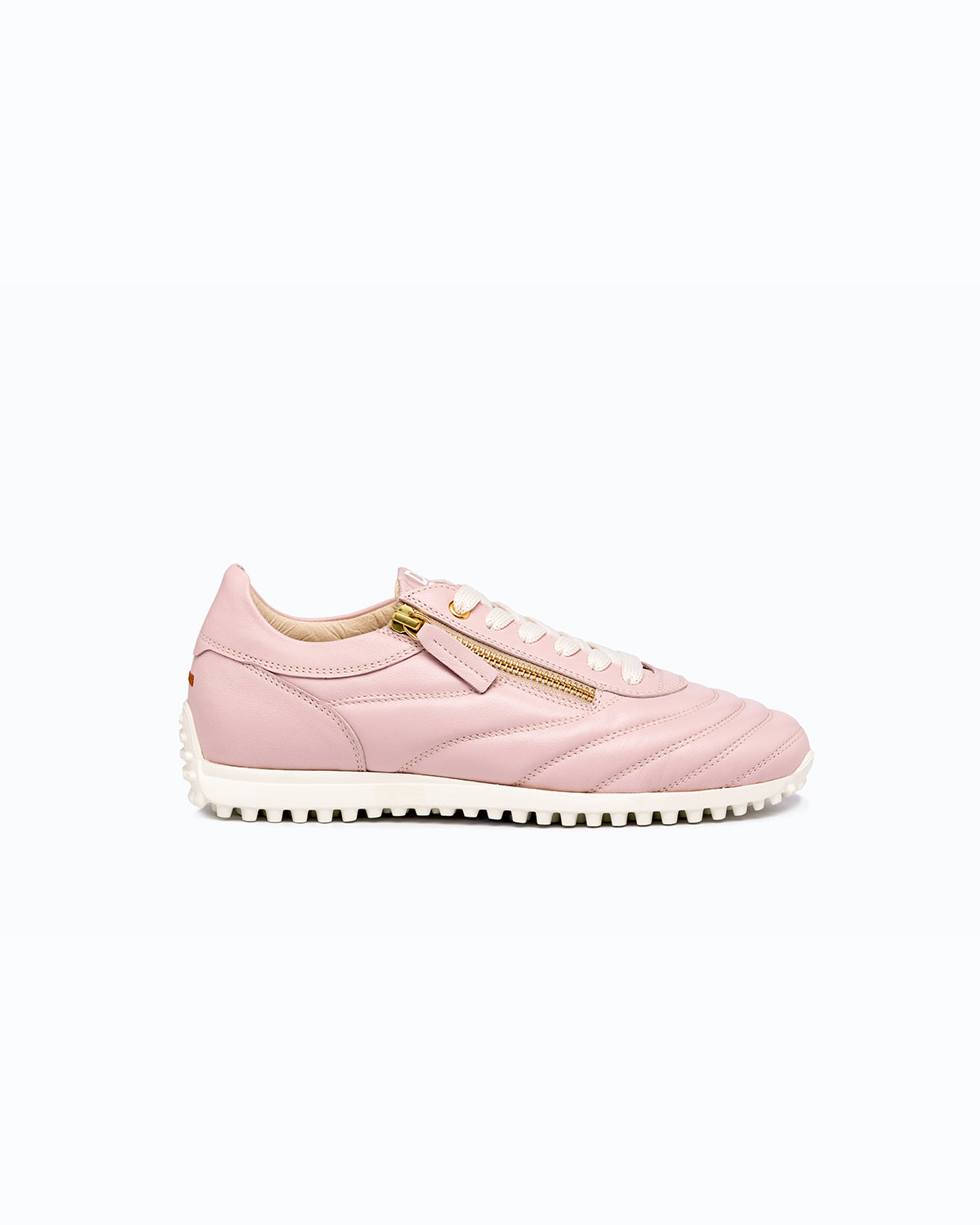 Pink DLS sneakers, shown in a studio still life.