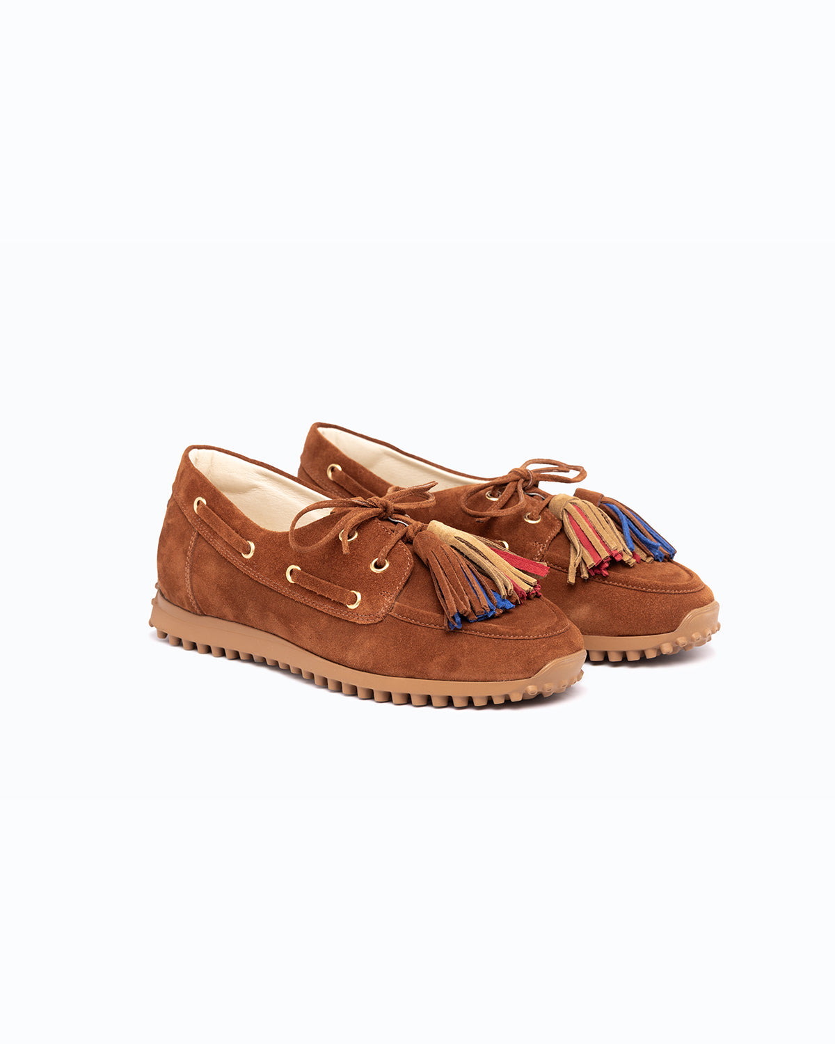 Brown, blue, red velour DLS boat shoes, shown in a studio still life.