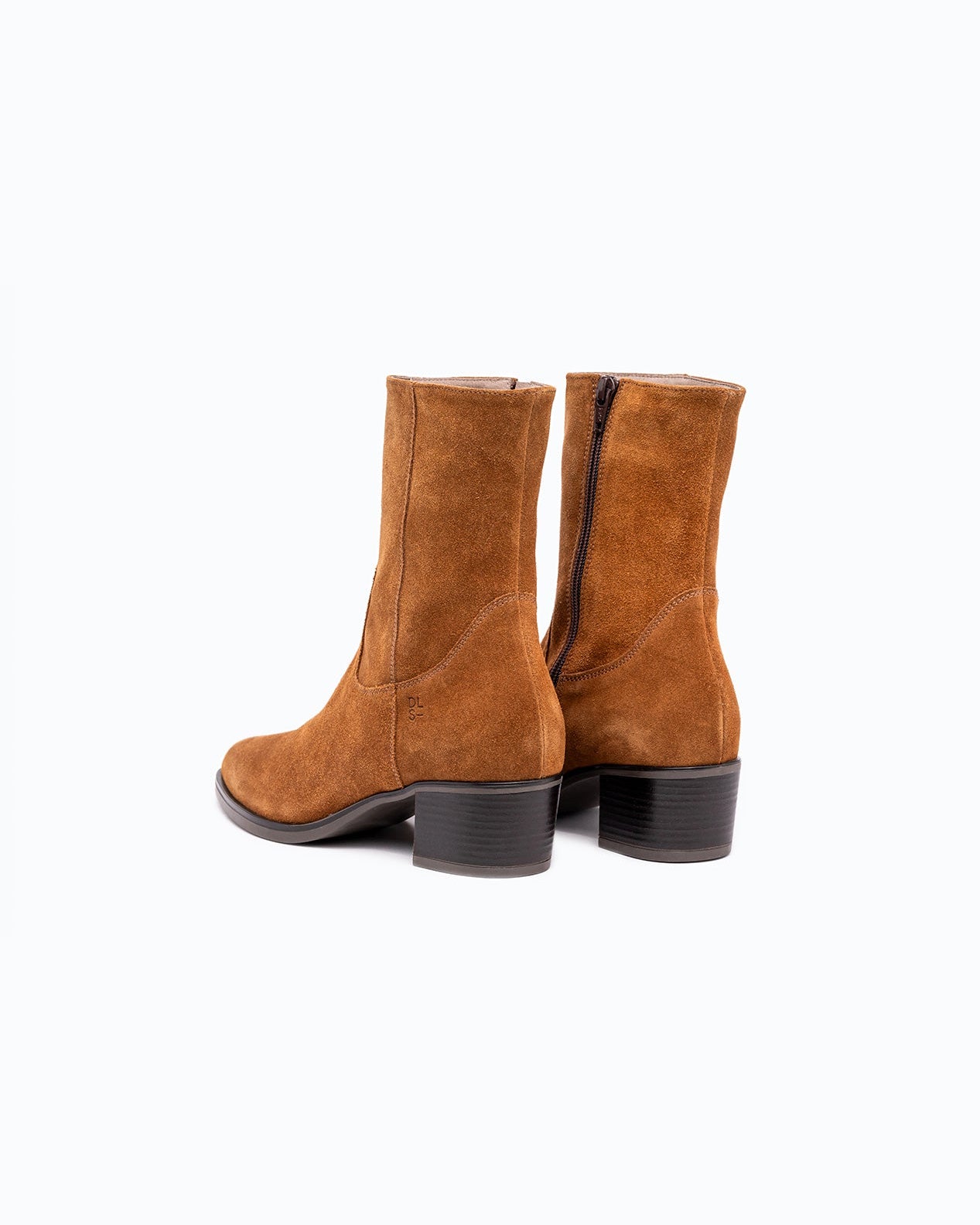 Brown leather and velour DLS ankle boots, shown in a studio still life.