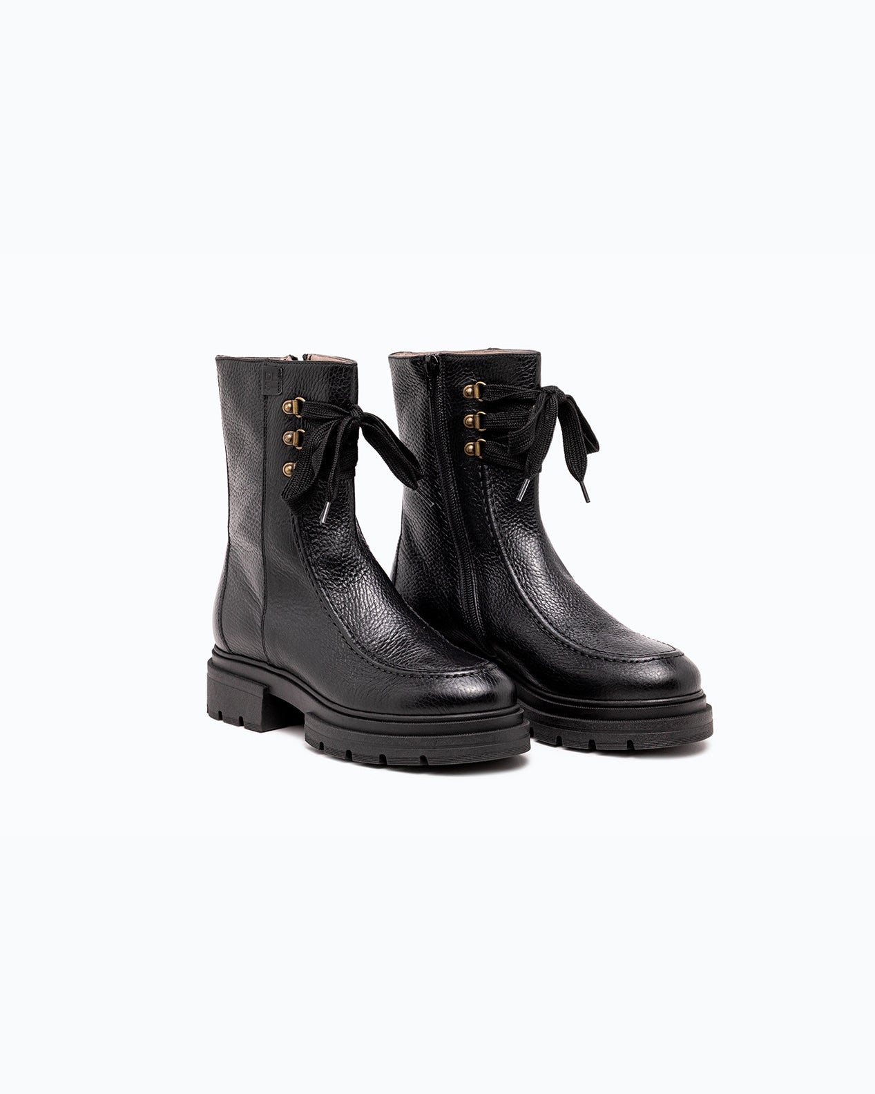 Black nappa leather DLS ankle boots, shown in a studio still life.