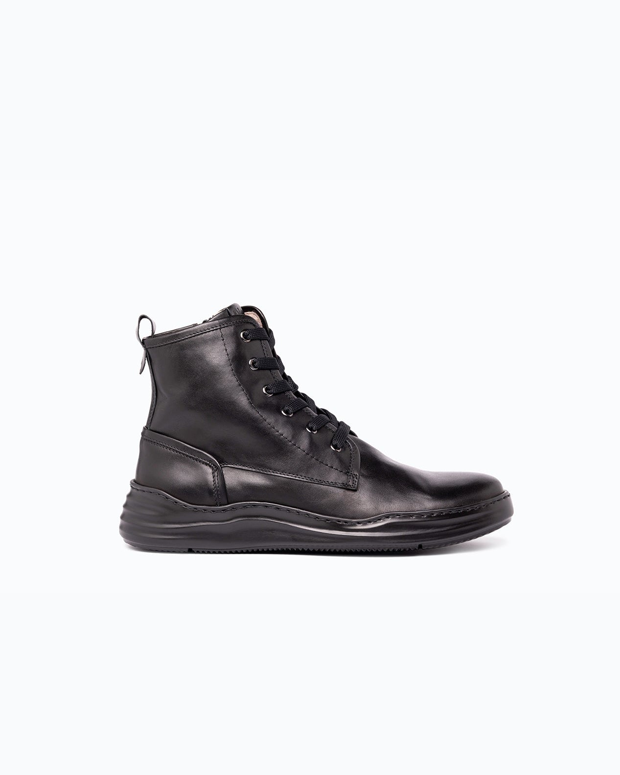 Black nappa leather DLS boots, shown in a studio still life.