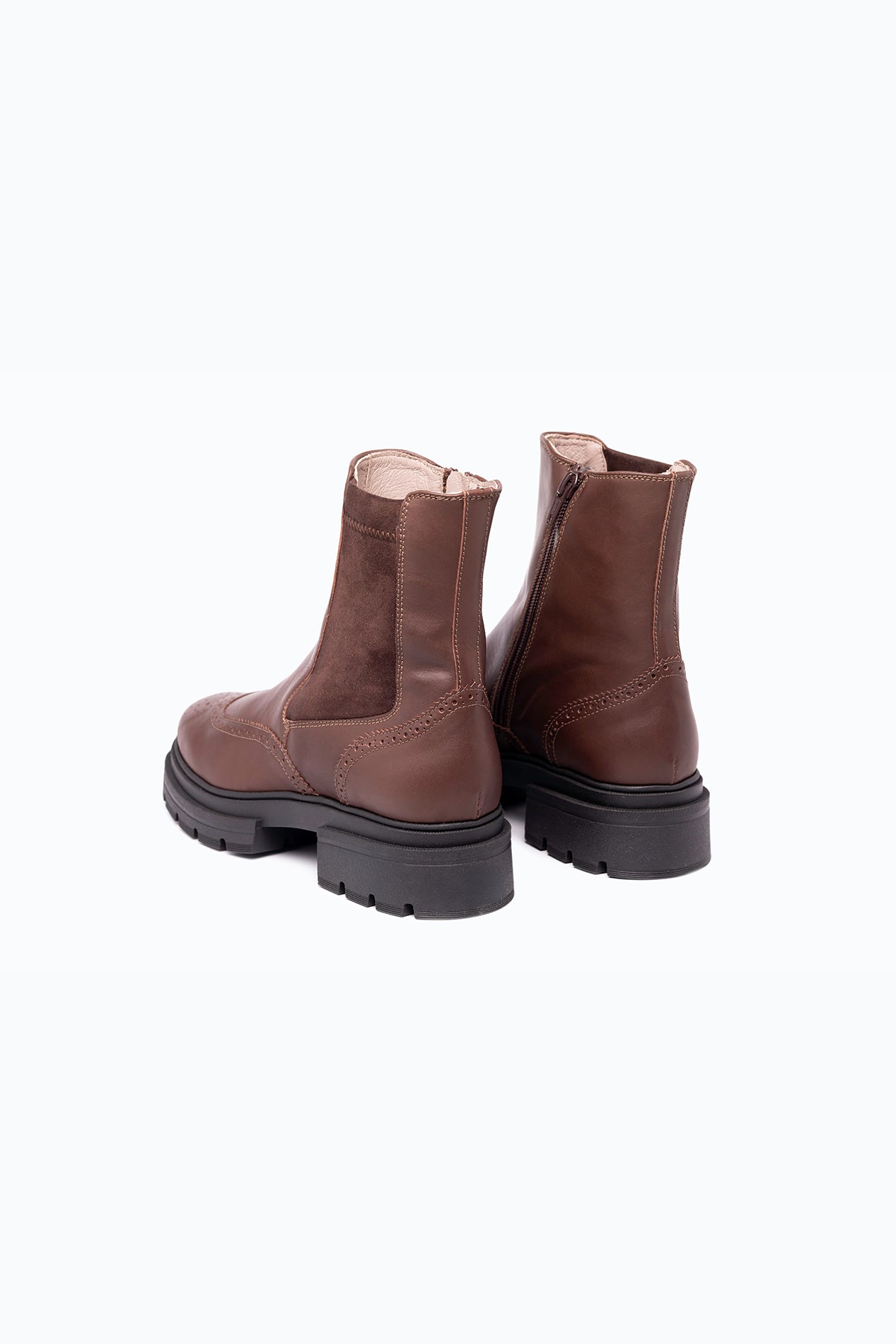 Black, brown velour DLS ankle boots, shown in a studio still life.