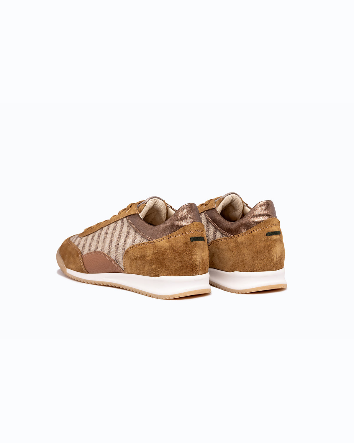 Brown velour and woven fabric DLS sneakers with side zip, shown in a studio still life.
