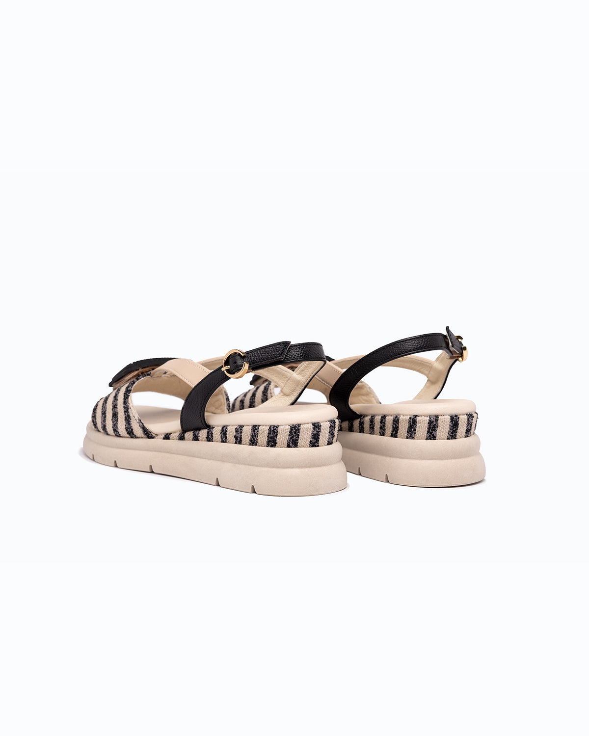 Black, beige woven fabric and nappa leather DLS sandals with side zip, shown in a studio still life.