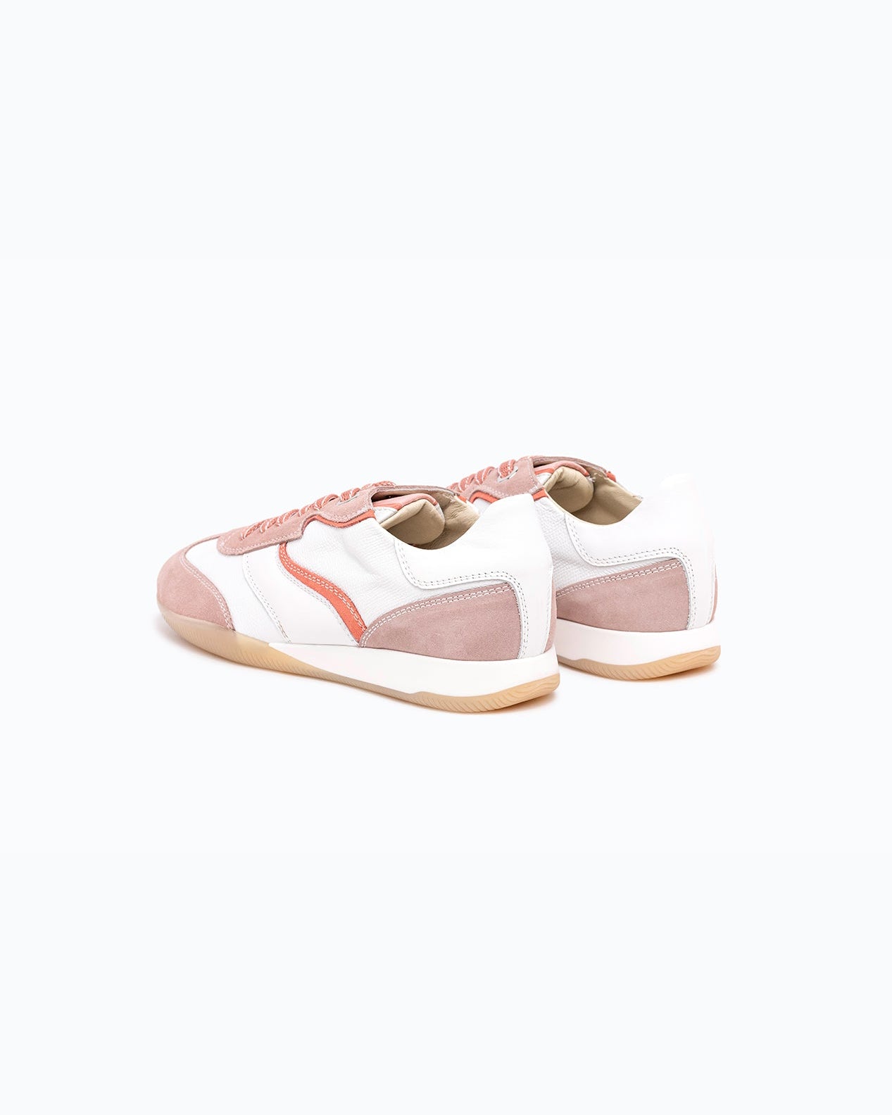 White, pink nappa leather and suede DLS sneakers, shown in a studio still life.