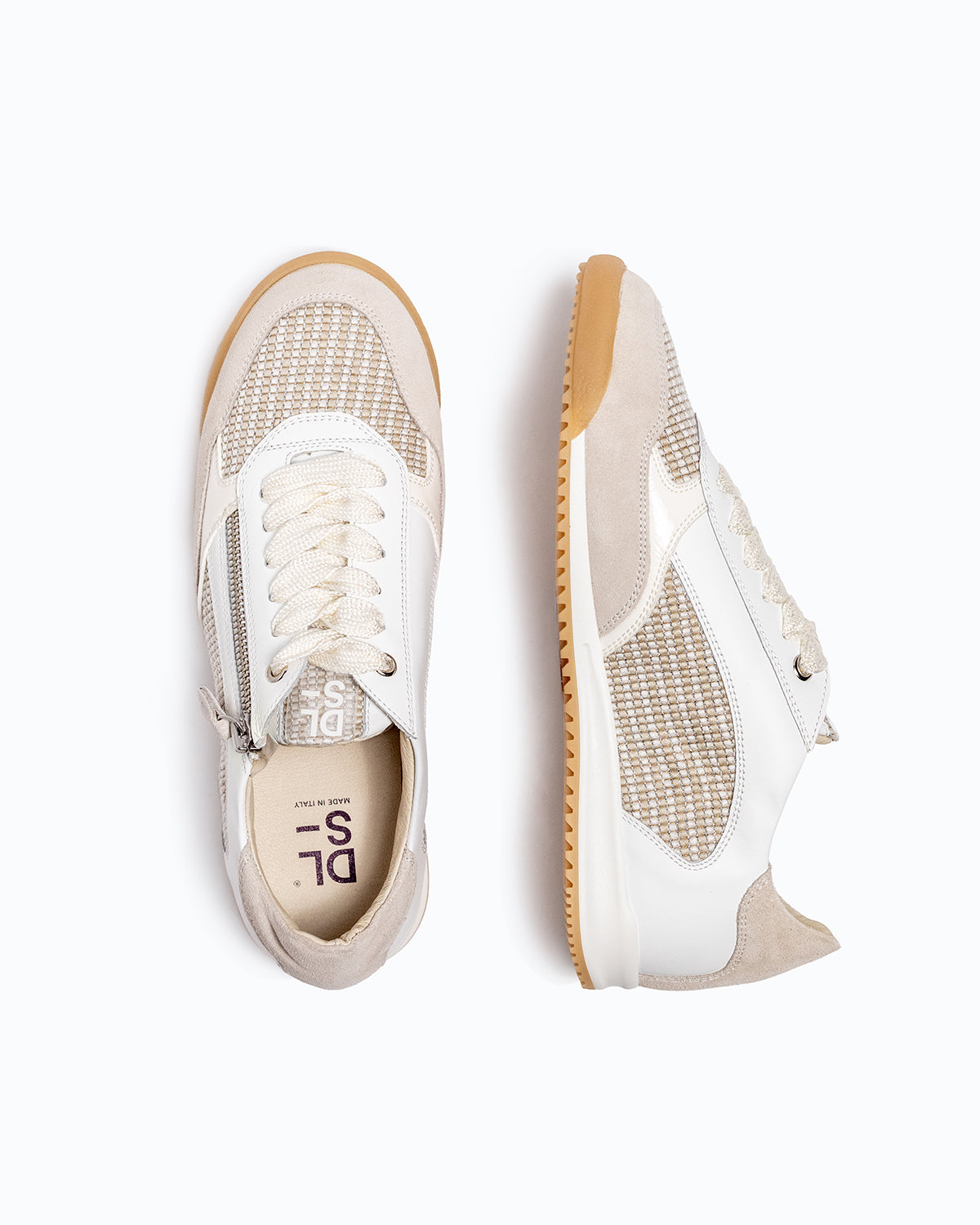 White, off-white nubuck and leather DLS sneakers, shown in a studio still life.