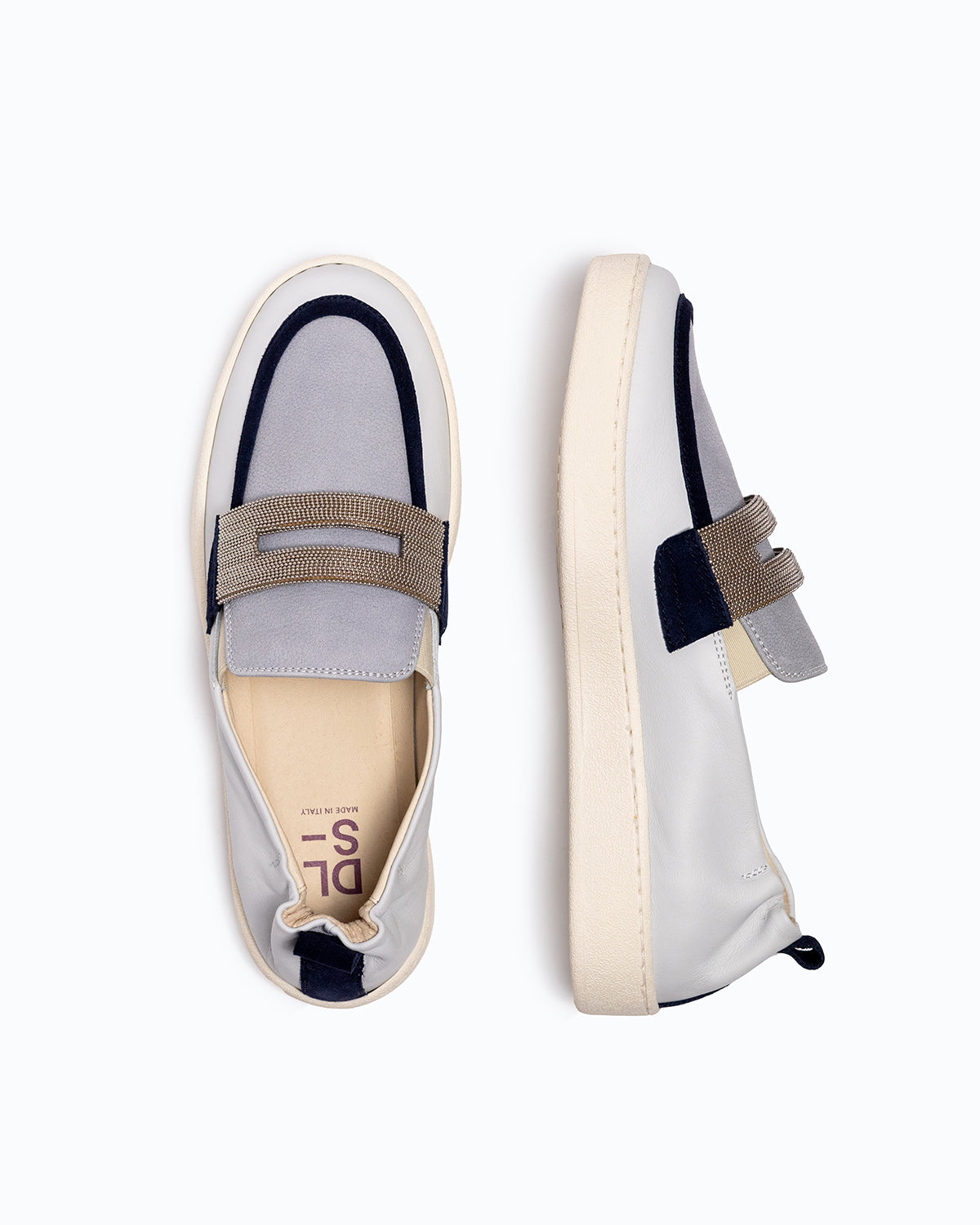 Off-white, sky blue, navy nappa leather and nubuck DLS loafers, shown in a studio still life.