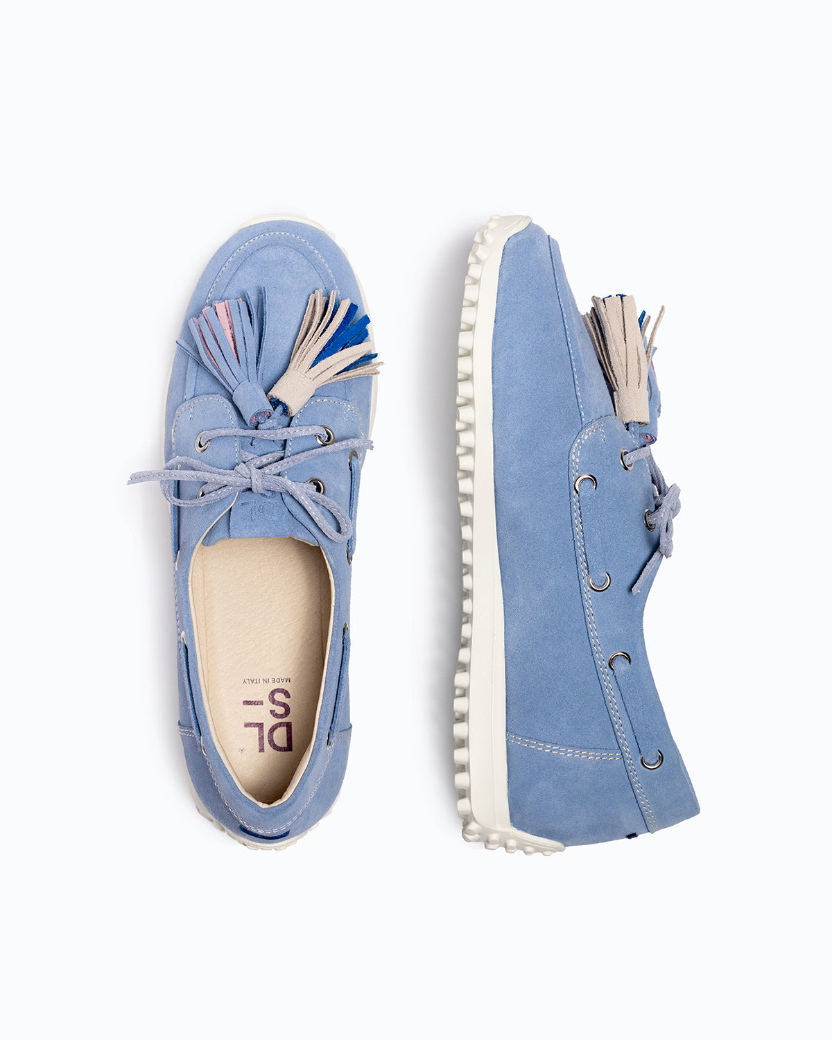 Sky blue, pink, blue velour DLS boat shoes, shown in a studio still life.