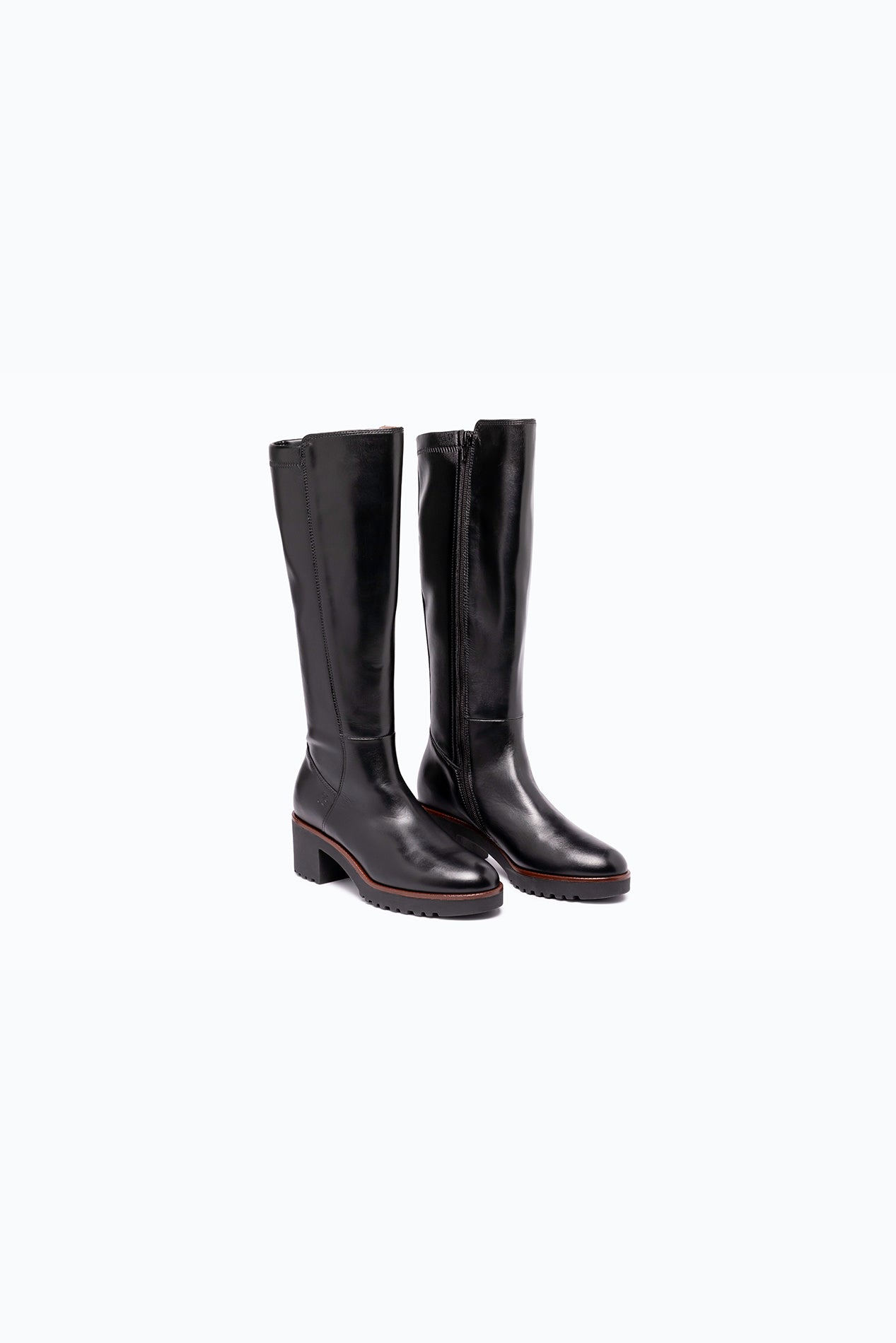 Black, brown DLS heeled boots, shown in a studio still life.