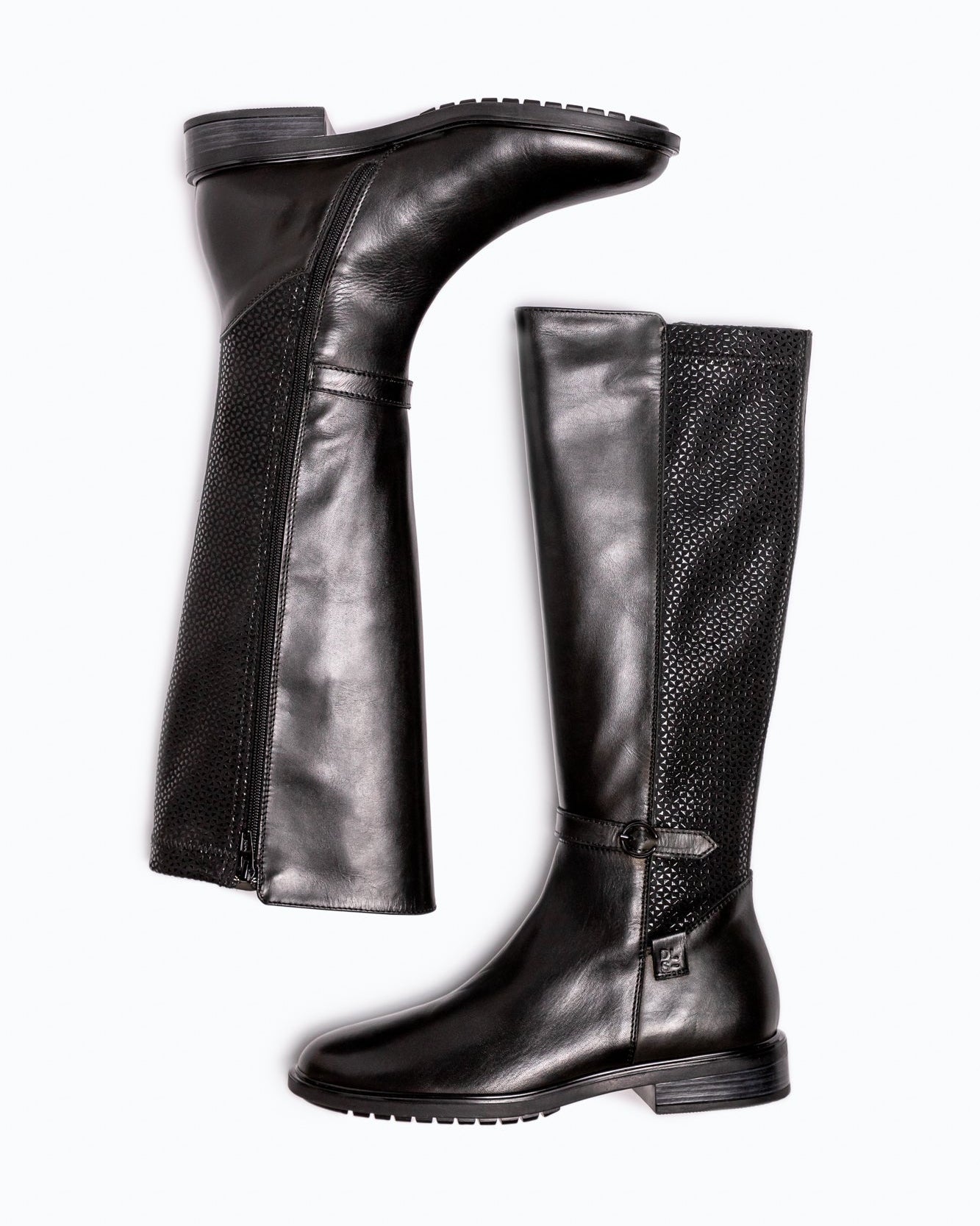 Black DLS boots, shown in a studio still life.