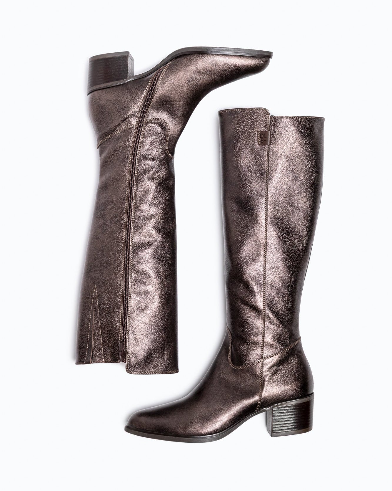 Brown DLS boots, shown in a studio still life.