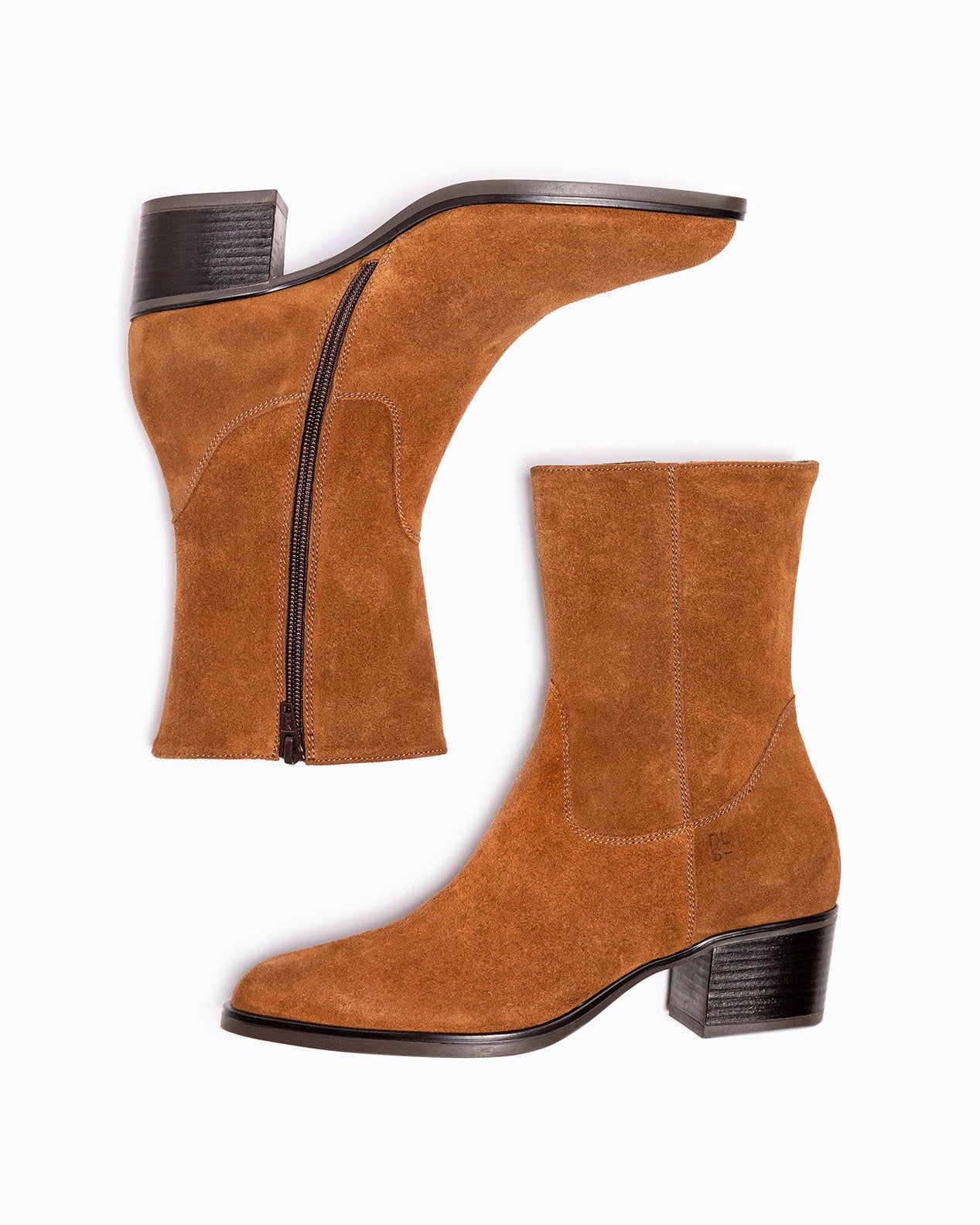 Brown leather and velour DLS ankle boots, shown in a studio still life.